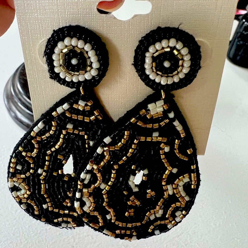 Black gold and white boutique earrings. Smoke free home.